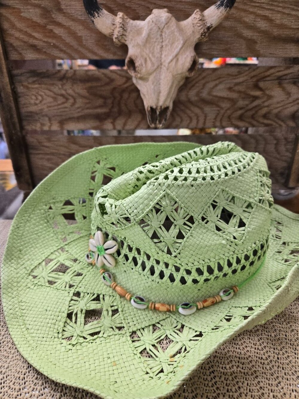 One size Green Woven Cowboy hat with shell detail band